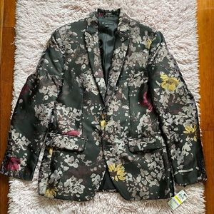 It is a new suit. Never been worn since I purchased it. The color is black combo